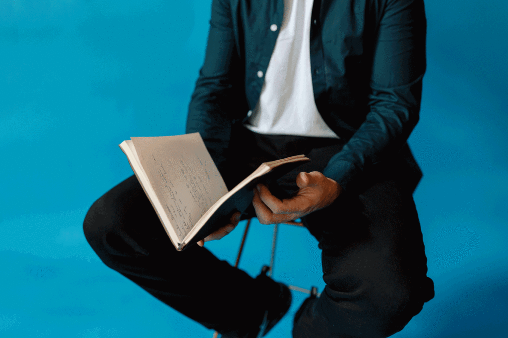 A gif of a person closing a notebook. 