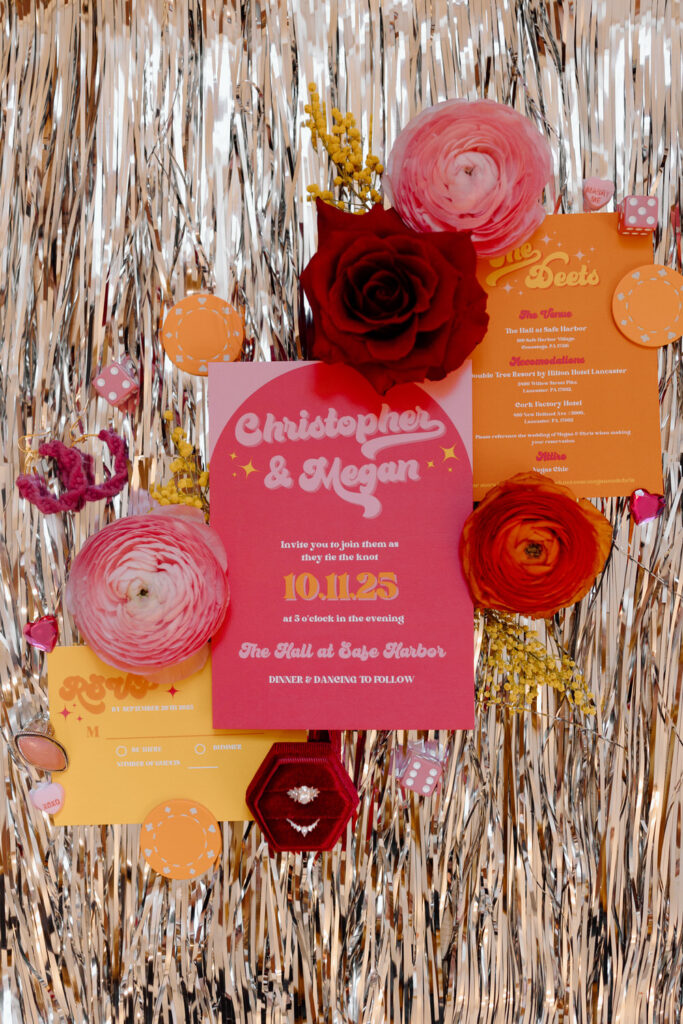 Close up of invitations for a Vegas theme wedding.