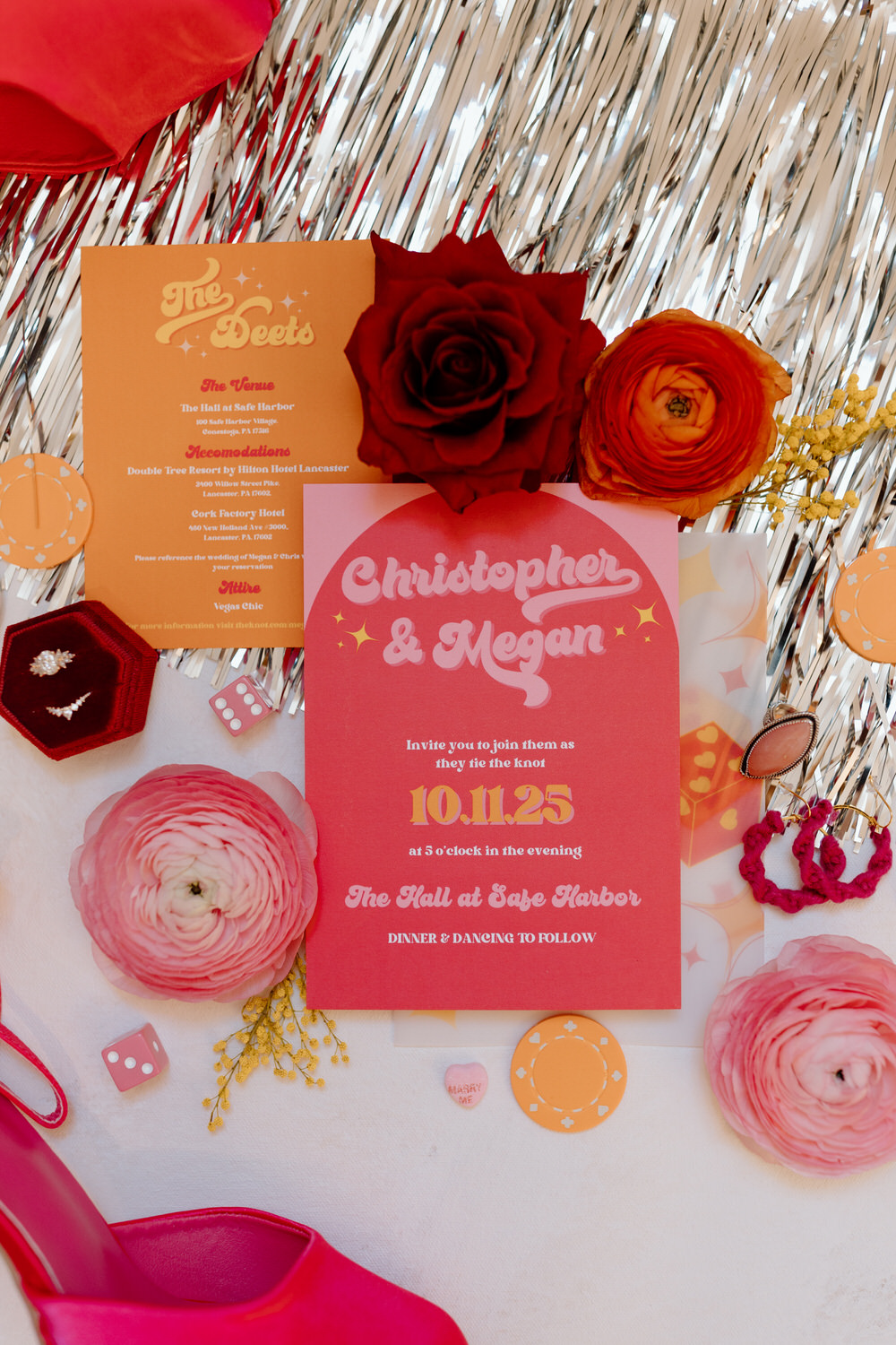 A pink and orange invitation design for Vegas themed wedding ideas.